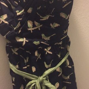 Navy dress w/ birds, green ribbon, fan detailing